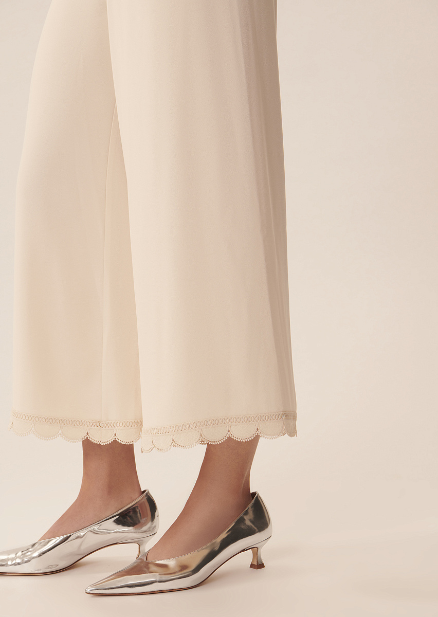 Брюки Positive из крепа в цвете экрю