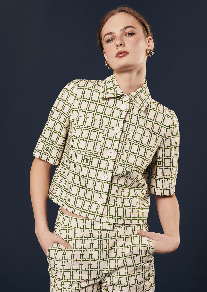 Christine блуза в цвете экрю с зеленым графическим дизайном